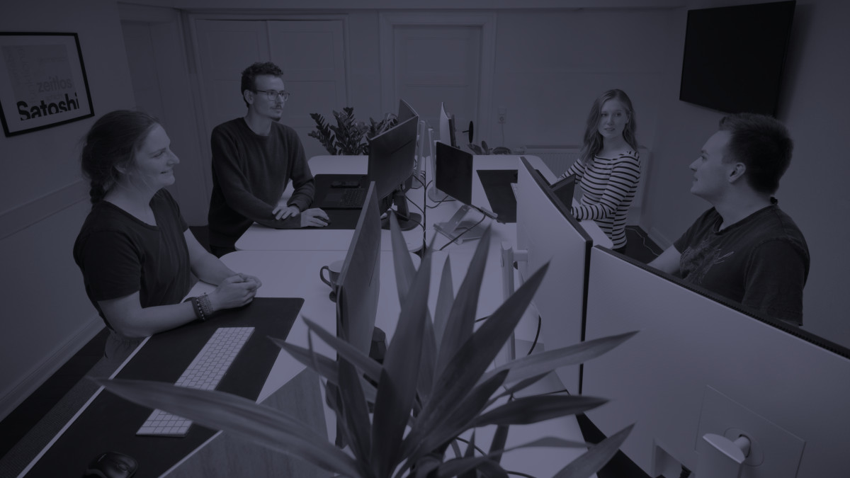 People talking in a shared office