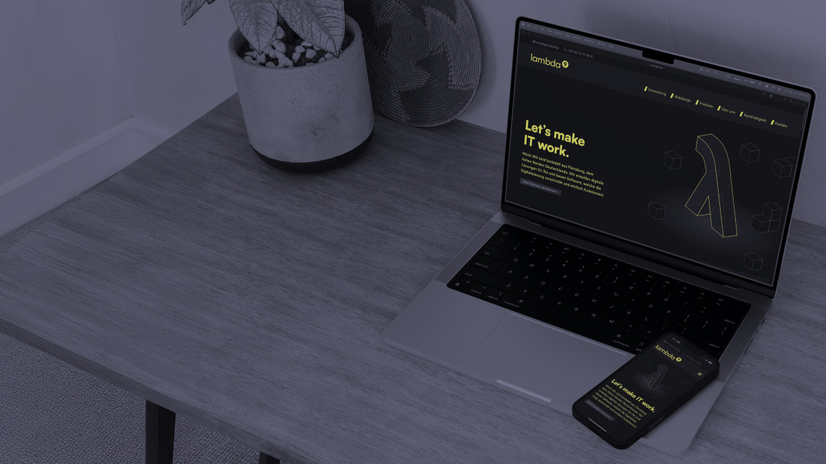 lambda9 website shown on a laptop and smartphone